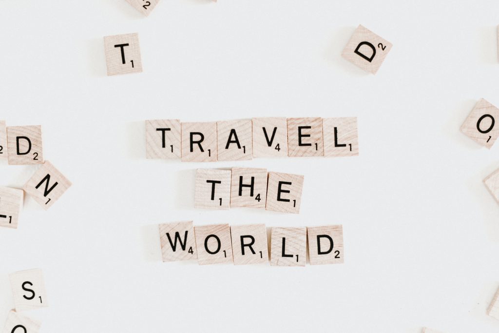 photo of the words "travel the world"
