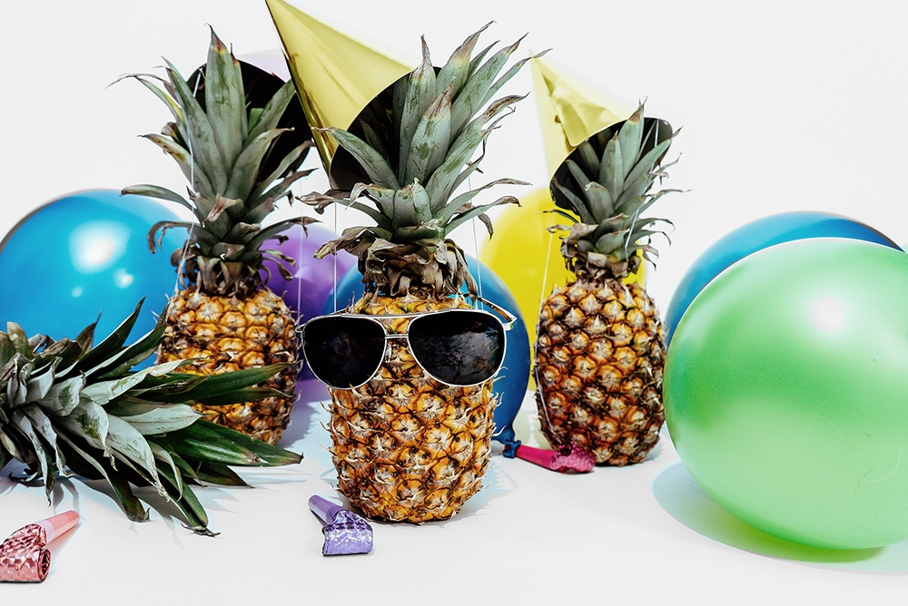 photo of a pineapple in sunglasses