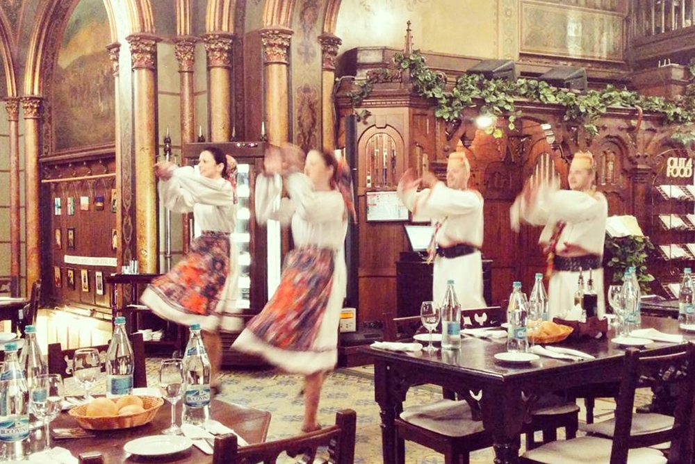 photo of girls dancing in a restaurant